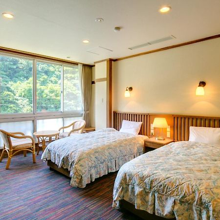 Yugawara-Onsen Manyoso Hotel Bagian luar foto
